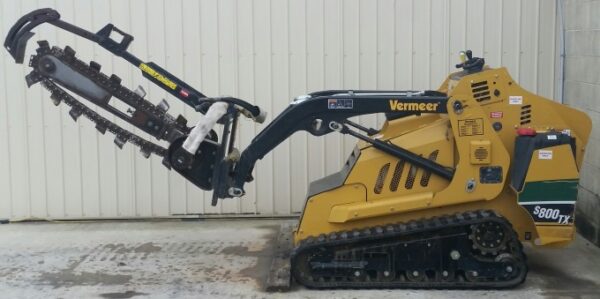 Loader, compact utility  Trencher attachment